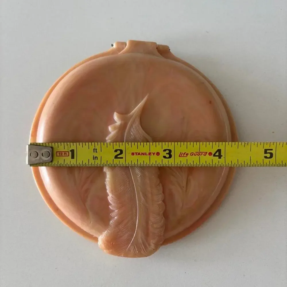 Vintage marbled blush powder compact with carved feather motif